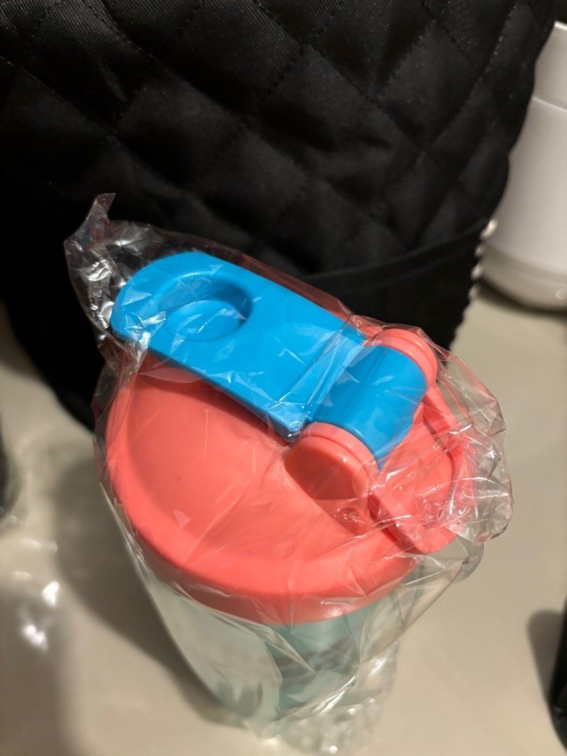 ON Shaker Bottle (Category: Water Bottles & Tumblers) located in Quezon City. Submitted by garagesale2026 (Listing ID 1466132896, Image 3). Description: - Brand new - Still in original plastic packaging - Features a teal body with a coral lid and a blue flip-top.