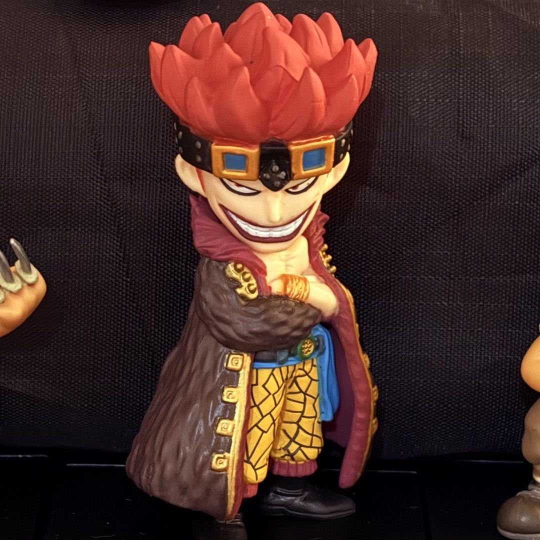 One Piece Eustass Kid Chibi Figure (Category: Figurines & Statues) located in Manila. Submitted by tj.merch (Listing ID 1466019054, Image 1). Description: - Character: Eustass Kid (One Piece) - Design: Spiky red hair, forehead goggles, signature dark coat, and yellow patterned pants - Quality: Sturdy build with a clean paint job - Stability: Stands well on its own without needing extra support - Display: Perfect addition to any One Piece collecti
