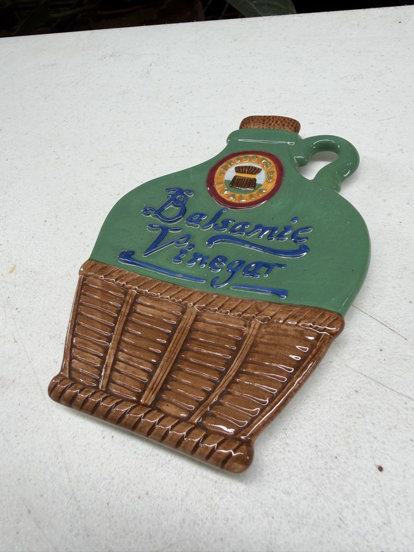 One piece wall decor (Category: Wall Decor) located in Davao. Submitted by parteawares2 (Listing ID 1466037181, Image 2). Description: One piece bottle shaped wall decor with noted chip at the back .