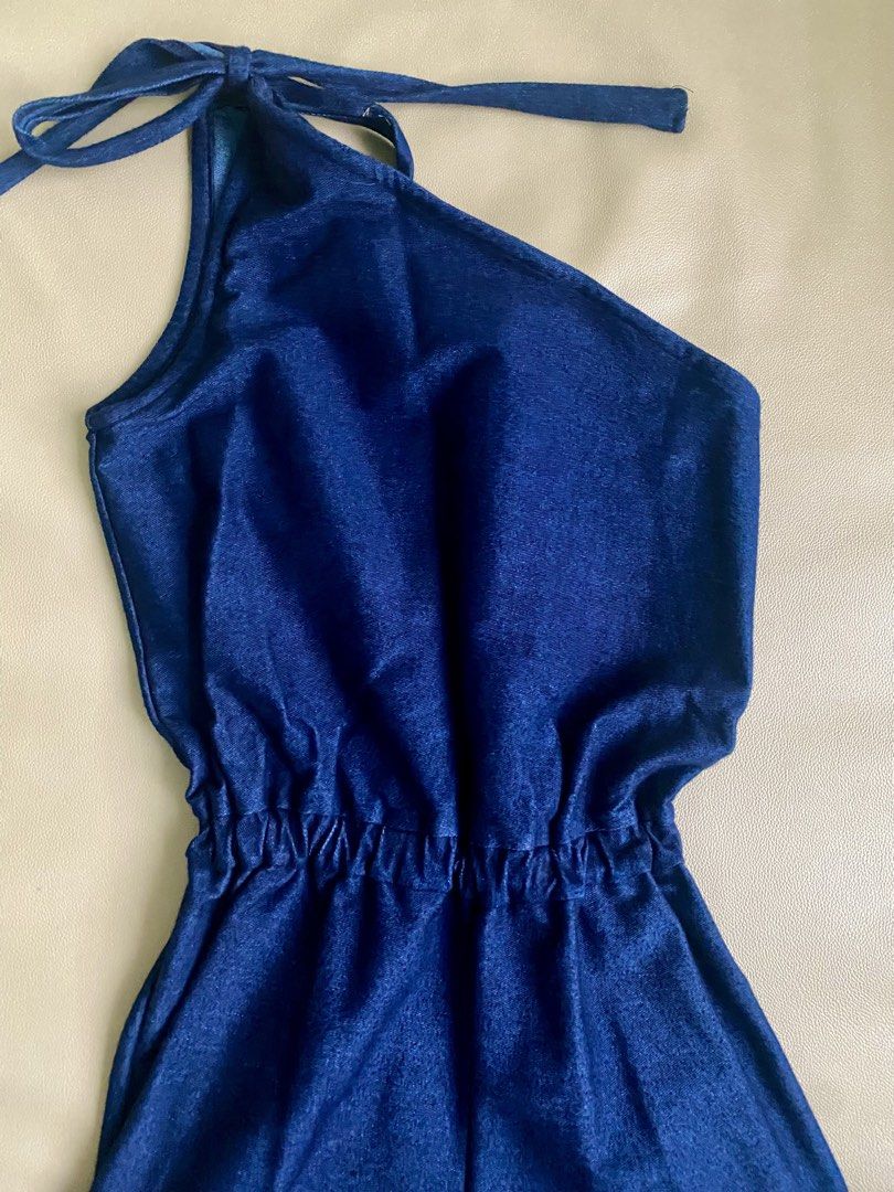 One-Shoulder Denim Romper with Tie Strap - Small to Medium (Category: Dresses) located in Quezon City. Submitted by dquad.dquad (Listing ID 1465999789, Image 3). Description: Denim Romper with Tie Strap - Small to Medium Php 600.00 Soft denim but thick. No issues. Bust - 34"-36" Waist - 26"-32" (garterized) Hips - 36"-40" Length - 28" Location: Scout Area. Bgy Roxas Quezon City .
