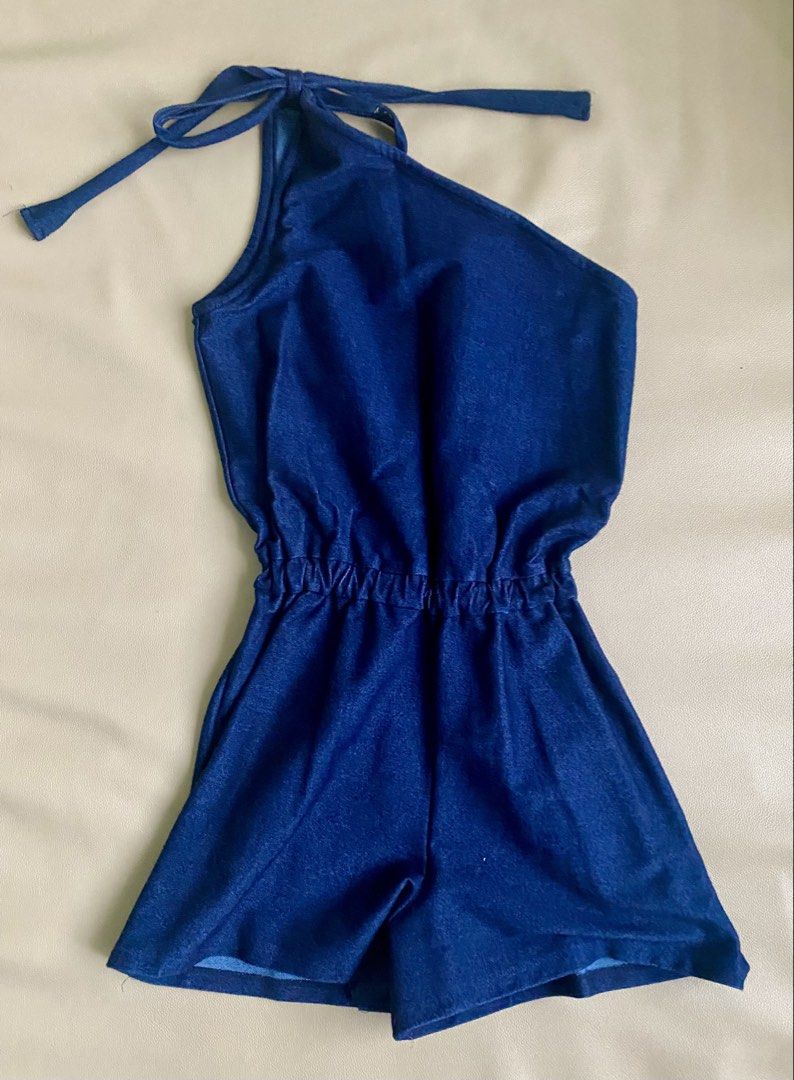 One-Shoulder Denim Romper with Tie Strap - Small to Medium (Category: Dresses) located in Quezon City. Submitted by dquad.dquad (Listing ID 1465999789, Image 2). Description: Denim Romper with Tie Strap - Small to Medium Php 600.00 Soft denim but thick. No issues. Bust - 34"-36" Waist - 26"-32" (garterized) Hips - 36"-40" Length - 28" Location: Scout Area. Bgy Roxas Quezon City .