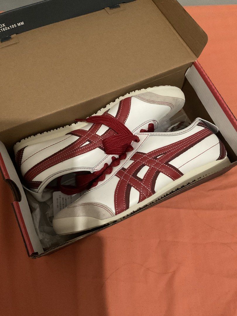 Onitsuka Tiger Mexico 66 Cream Samba (Category: Sneakers) located in Las Pinas. Submitted by kthingsandcloset (Listing ID 1466123688, Image 1). Description: - Brand: Onitsuka Tiger Mexico 66 - Got it from HK for 10k - Colorway: Cream and Samba (White leather upper, deep red side stripes, red laces) - Size: US Women 8 / UK 7 / EUR 41.5 / CM 26.0 - Condition: Brand new, unworn, clean soles straight from the box - Inclusions: Original box and extra 