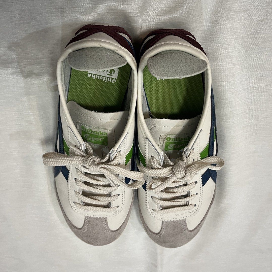 Onitsuka Tiger Mexico 66 White Blue Green (Category: Sneakers) located in Dasmarinas. Submitted by minx203 (Listing ID 1466091163, Image 3). Description: - Brand: Onitsuka Tiger Mexico 66 - Colorway: White leather upper with grey suede toe cap, blue/green side stripes - Details: Green heel flaps with branding, green insoles, cream laces - Condition: Gently handled, very clean overall appearance - Style: Classic retro low-top sneakers, highly vers