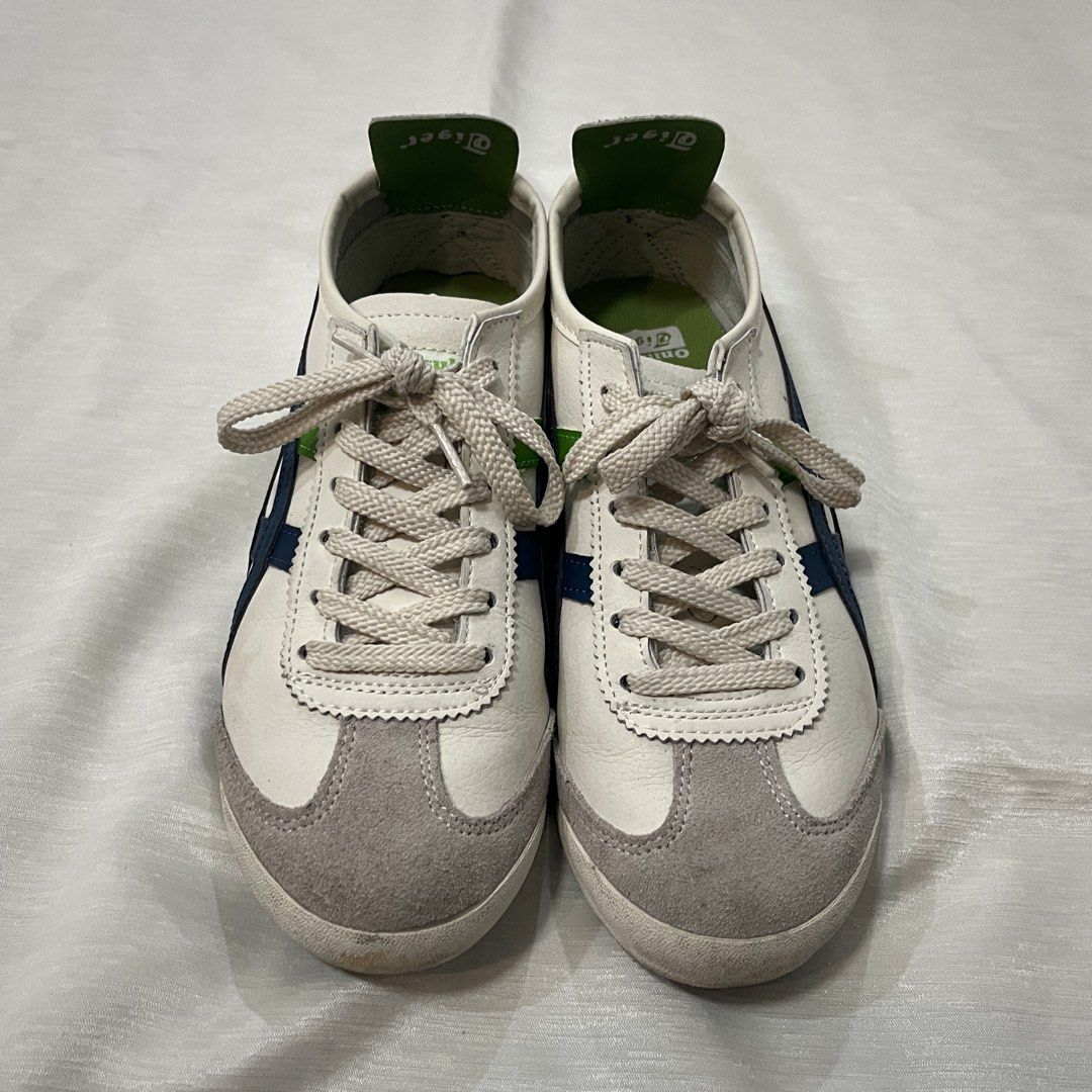 Onitsuka Tiger Mexico 66 White Blue Green (Category: Sneakers) located in Dasmarinas. Submitted by minx203 (Listing ID 1466091163, Image 2). Description: - Brand: Onitsuka Tiger Mexico 66 - Colorway: White leather upper with grey suede toe cap, blue/green side stripes - Details: Green heel flaps with branding, green insoles, cream laces - Condition: Gently handled, very clean overall appearance - Style: Classic retro low-top sneakers, highly vers