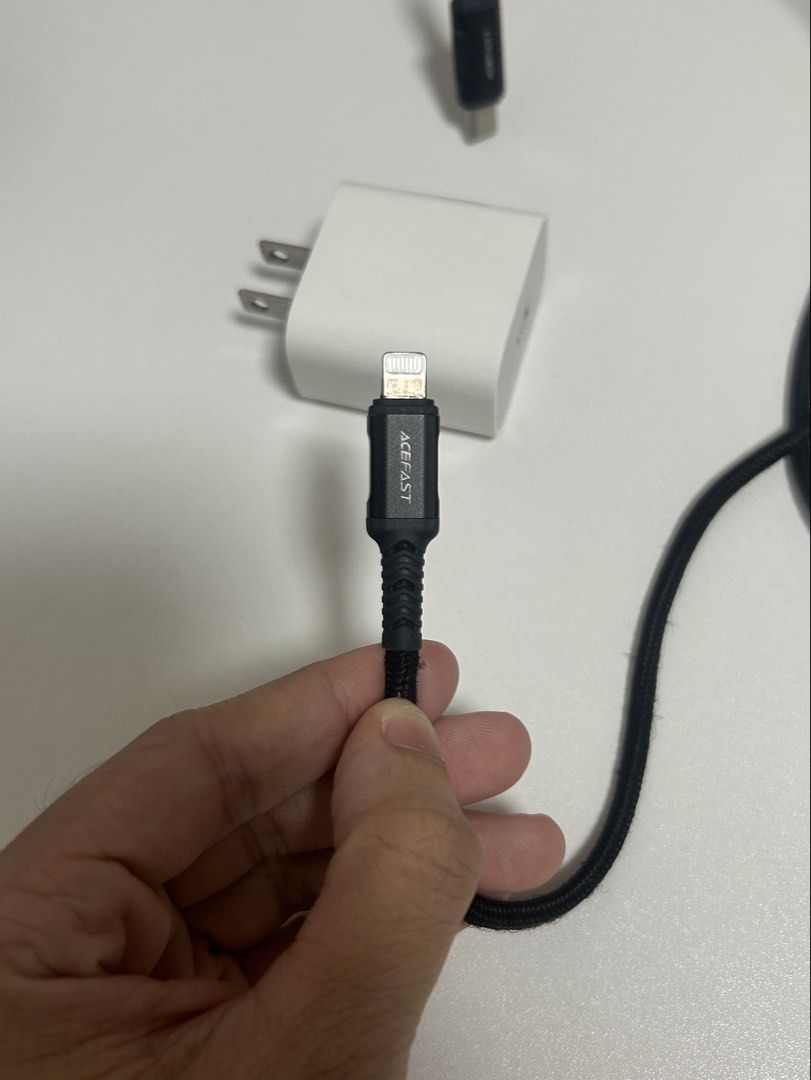 Original Apple iPhone Power Adapter + ACEFAST Lightning Cable (Category: Chargers & Cables) located in San Mateo. Submitted by pionaaa (Listing ID 1465954661, Image 2). Description: • Original Apple power adapter • ACEFAST Lightning charging cable • Black braided cable • Pre-owned.