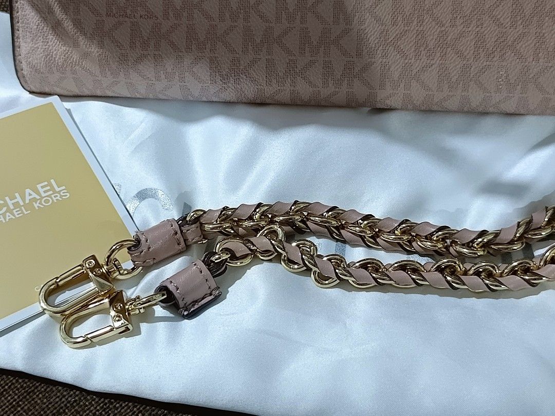 Original Michael Kors Carmen Medium Flap Belted Satchel (Category: Luxury Bags & Wallets) located in Caloocan City. Submitted by warmfox.b260fa (Listing ID 1466067939, Image 3). Description: Michael Kors Carmen Medium Flap Belted Satchel in the powder blush multi signature colorway. Size: 11”W x 7.75”H x 5”D Bought from Europe Used twice Like New No damage at all I'm open for offers. Just PM. 🩵 .