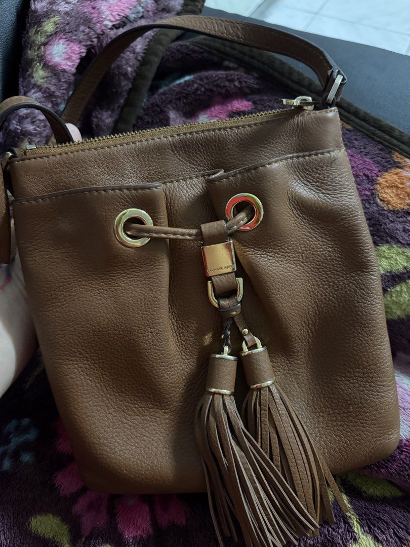 Original M.K Sling Bag (Category: Cross-body Bags) located in Antipolo. Submitted by saphiraaa03 (Listing ID 1465990013, Image 1). Description: Preloved Original M.K Sling Bag. Needs Cleaning. No Major Issue. see actual photos posted Location: Lower Antipolo.