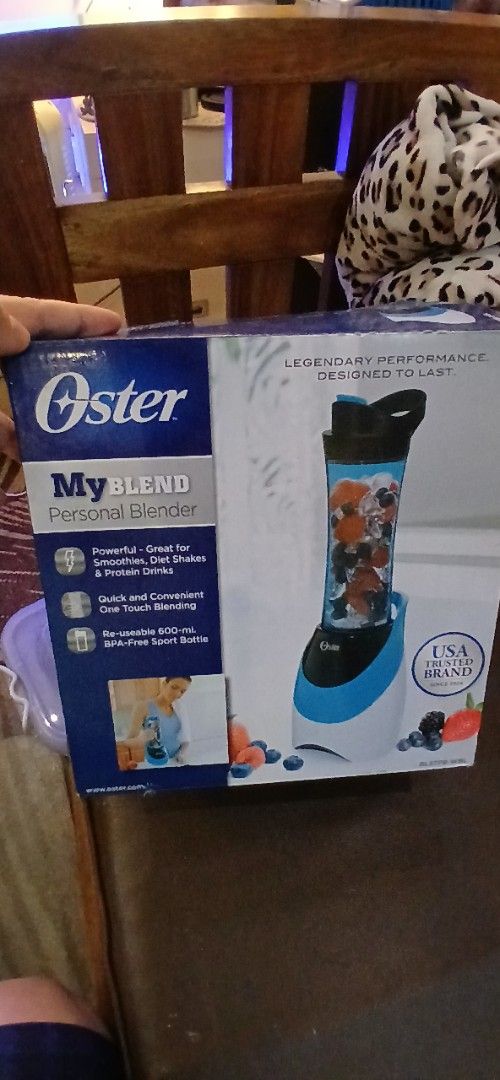 Oster My Blend Personal Blender (Category: Juicers, Blenders & Grinders) located in Marikina City. Submitted by darthvader888 (Listing ID 1466069579, Image 1). Description: - Brand: Oster My Blend personal blender - Color: Blue and black design - Condition: Brand new, never opened, still in original box with plastic wrapping intact - Features: Quick one-touch blending for smoothies, protein drinks, and shakes - Inclusion: 600ml re-usable sport bo