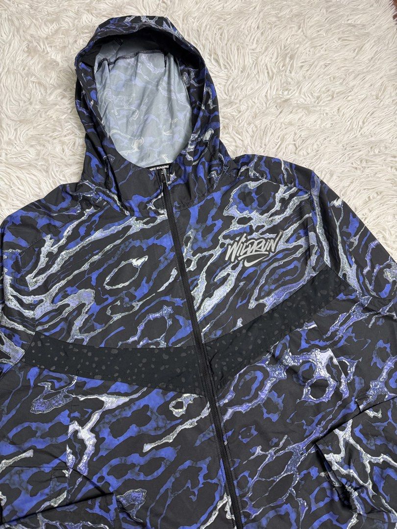 Outdoor windbreaker (Category: Coats, Jackets and Outerwear) located in Baguio. Submitted by sellingtonshop (Listing ID 1466062031, Image 2). Description: s12. Nike Wild Run camo runners’ jacket *wind and water resistant Size: M fits L Dimes: 28*24 Condition: excellent Issue: none Grab: 980.