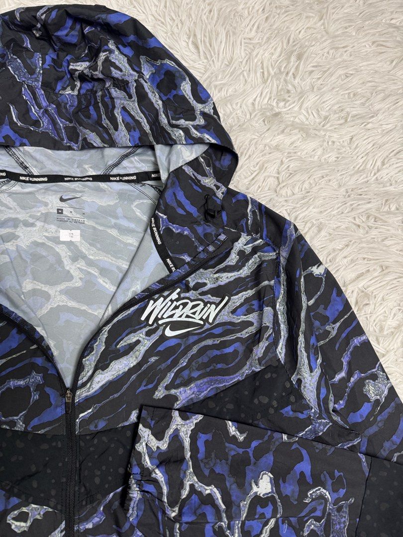 Outdoor windbreaker (Category: Coats, Jackets and Outerwear) located in Baguio. Submitted by sellingtonshop (Listing ID 1466062031, Image 3). Description: s12. Nike Wild Run camo runners’ jacket *wind and water resistant Size: M fits L Dimes: 28*24 Condition: excellent Issue: none Grab: 980.