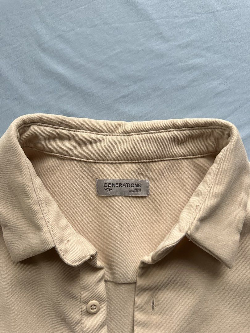 OXGN Cream Long Sleeve Button Up Shirt Medium (Category: Formal Shirts) located in Lipa City. Submitted by KryzbielFinds (Listing ID 1466089476, Image 3). Description: - Brand: OXGN - Color: Neutral beige / cream - Style: Long sleeve button-up shirt with classic collar - Fit: Regular fit - Features: Single chest pocket and button cuffs - Condition: Clean, ready to wear - Versatility: Easy to match with casual pants or denim - Used once - No issue