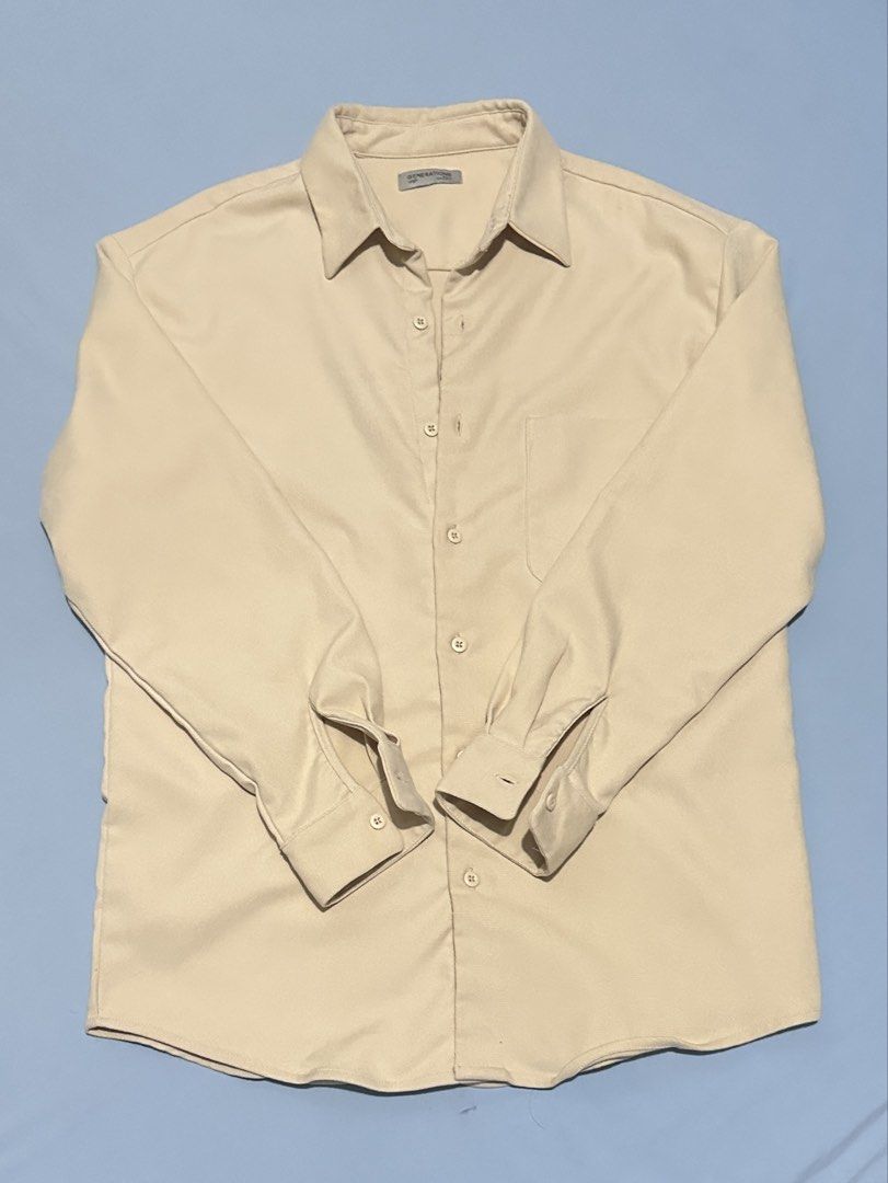 OXGN Cream Long Sleeve Button Up Shirt Medium (Category: Formal Shirts) located in Lipa City. Submitted by KryzbielFinds (Listing ID 1466089476, Image 1). Description: - Brand: OXGN - Color: Neutral beige / cream - Style: Long sleeve button-up shirt with classic collar - Fit: Regular fit - Features: Single chest pocket and button cuffs - Condition: Clean, ready to wear - Versatility: Easy to match with casual pants or denim - Used once - No issue