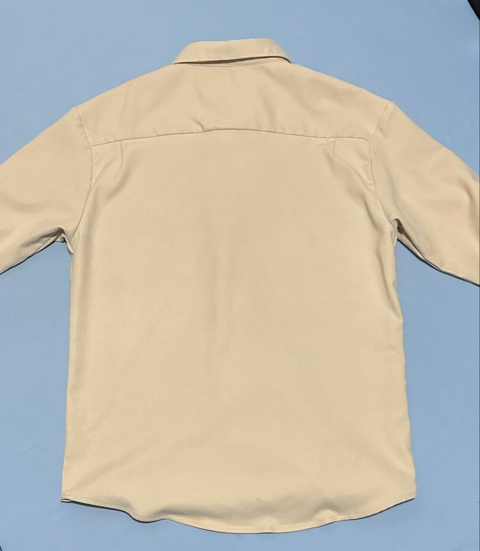OXGN Cream Long Sleeve Button Up Shirt Medium (Category: Formal Shirts) located in Lipa City. Submitted by KryzbielFinds (Listing ID 1466089476, Image 2). Description: - Brand: OXGN - Color: Neutral beige / cream - Style: Long sleeve button-up shirt with classic collar - Fit: Regular fit - Features: Single chest pocket and button cuffs - Condition: Clean, ready to wear - Versatility: Easy to match with casual pants or denim - Used once - No issue