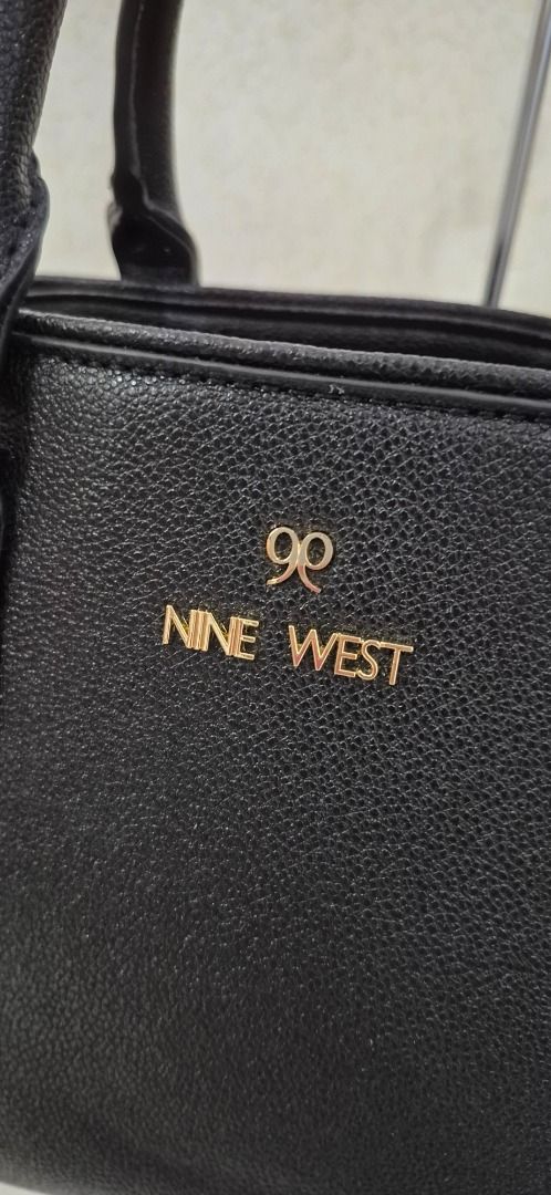 P13-990 Nine West Black Handbag (Category: Shoulder Bags) located in Valenzuela. Submitted by dailyhappyfinds (Listing ID 1466100079, Image 3). Description: BRAND: Nine West -Brand new without tag -Minimal missing stitches on one side. Unnoticeable. *Mall pullout/ factory pullout. Please manage your expectations. .