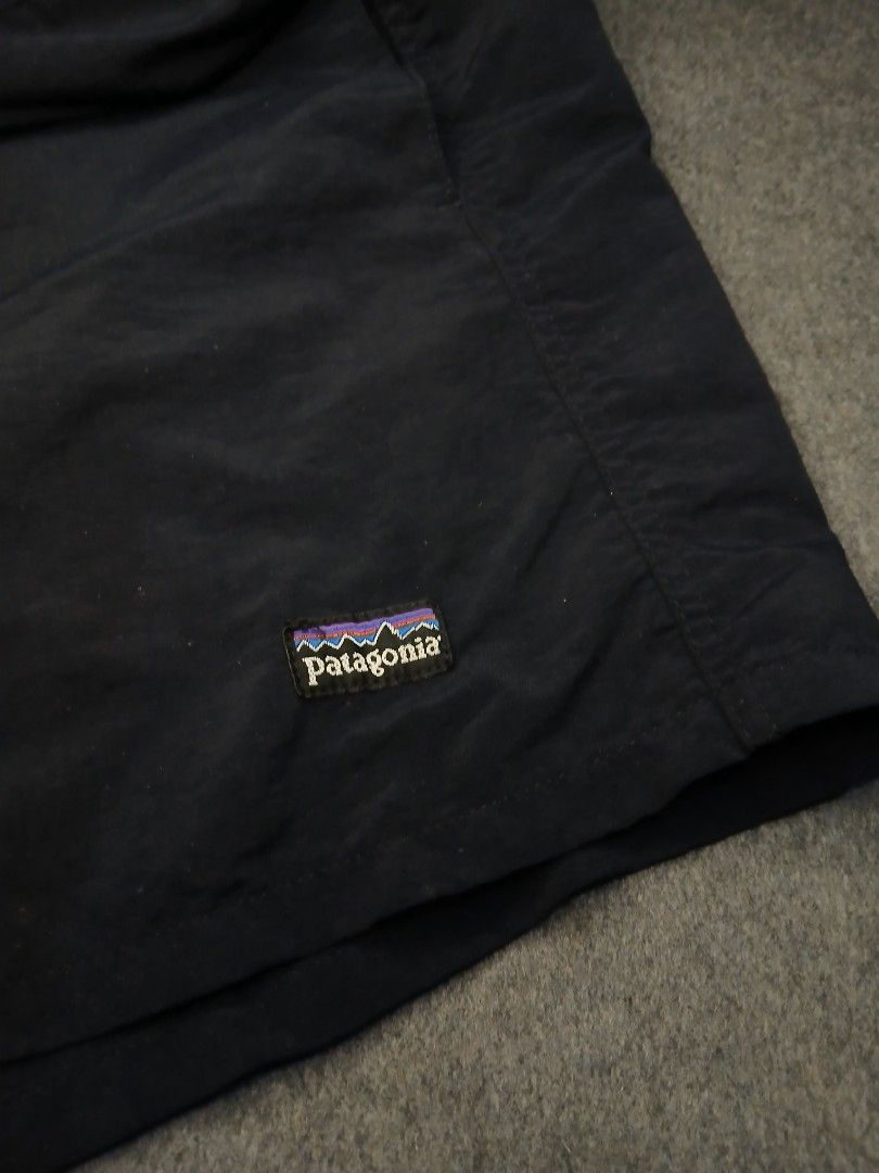 Patagonia Black Shorts womens (Category: Shorts) located in Caloocan City. Submitted by benthriftshp (Listing ID 1466136154, Image 2). Description: - Color: Black - Brand: Patagonia - Style: Vintage woven logo tags on hem and inner waistband - Fit: Elastic waistband with adjustable drawstring - Fabric: Lightweight and breathable - Measurements: ~14 inches across flat waist - Condition: Clean, no tears or stains 29-33×13 dimes 400+sf.