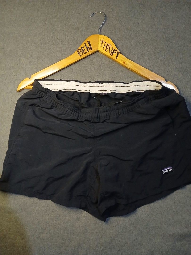 Patagonia Black Shorts womens (Category: Shorts) located in Caloocan City. Submitted by benthriftshp (Listing ID 1466136154, Image 1). Description: - Color: Black - Brand: Patagonia - Style: Vintage woven logo tags on hem and inner waistband - Fit: Elastic waistband with adjustable drawstring - Fabric: Lightweight and breathable - Measurements: ~14 inches across flat waist - Condition: Clean, no tears or stains 29-33×13 dimes 400+sf.