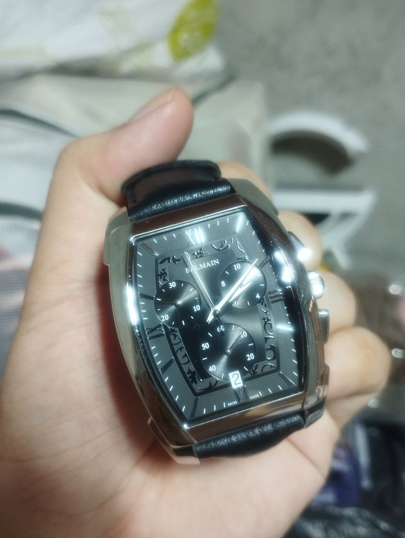 Pierre Balmain Arcade Chrono Swiss Made Chronograph Watch (Category: Luxury Watches) located in Pasig City. Submitted by nyjah1997 (Listing ID 1466009076, Image 1). Description: - Brand: Pierre Balmain - Movement: Swiss-made chronograph - Case: Tonneau shape with stainless steel back (Numbered: 5741) - Dial: Black textured dial with sub-dials and date window at 6 o'clock - Strap: Genuine black leather - Details: Crown and pushers on the right sid