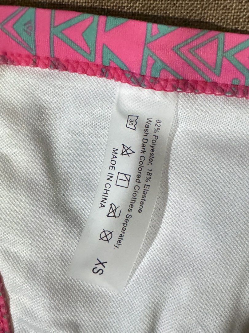Pink bikini set xs-s size. Never used (Category: Bikinis & Swimsuits) located in Taguig. Submitted by jdrysssss (Listing ID 1466039025, Image 2). Description: - Vibrant pink and turquoise paisley print - Size: Extra Small (XS) - Small (S) - Material: 82% polyester, 18% elastane - Triangle top with halter ties and playful ruffles - Matching bottoms - Includes removable padding slots .