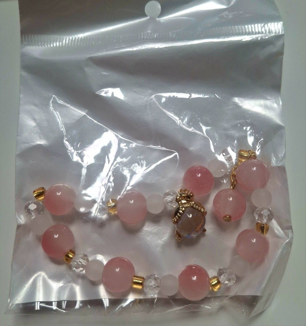 Pink crystal beaded bracelet with dangling charm (Category: Bracelets) located in Taguig. Submitted by fits.for.less (Listing ID 1466096639, Image 2). Description: 60 pesos MOP: Gcash MOD: lalamove/grab, pick-up if malapit lang.