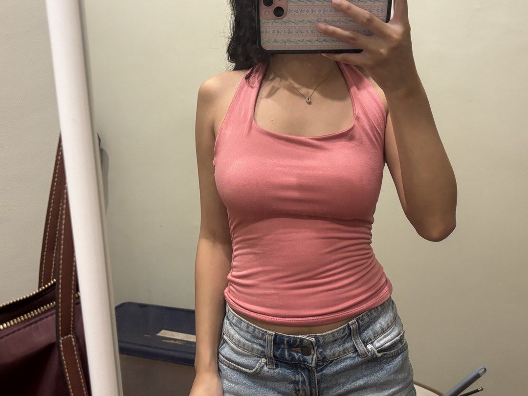 Pink halter neck tank top sleeveless (Category: Sleeveless) located in Paranaque City. Submitted by domisclosett (Listing ID 1466092682, Image 2). Description: - Color: Pink - Style: Halter top with scoop neckline loc: parañaque/muntinlupa area mop: gcash, maribank, gotyme mod: lalamove or j&t, sf c/o buyer.