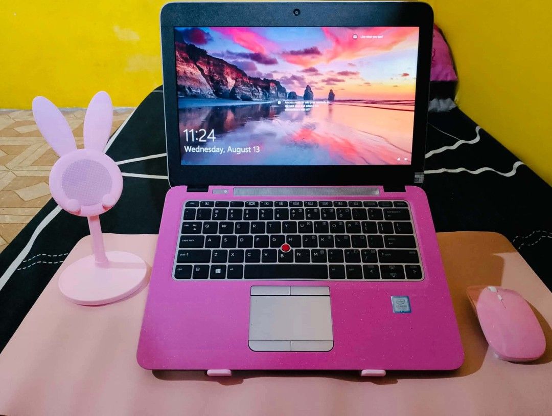 Pink HP Laptop Intel Core i5 with Accessories Bundle (Category: Laptops & Notebooks) located in Quezon City. Submitted by ricoav (Listing ID 1466152618, Image 1). Description: - HP Laptop with Intel Core i5 processor - Customized with a stylish pink skin wrap - Condition: Screen is cracked and damaged (Selling for parts/repair) - Complete pink aesthetic bundle including matching wireless mouse, laptop sleeve, and laptop stand - Extras: Phone hold
