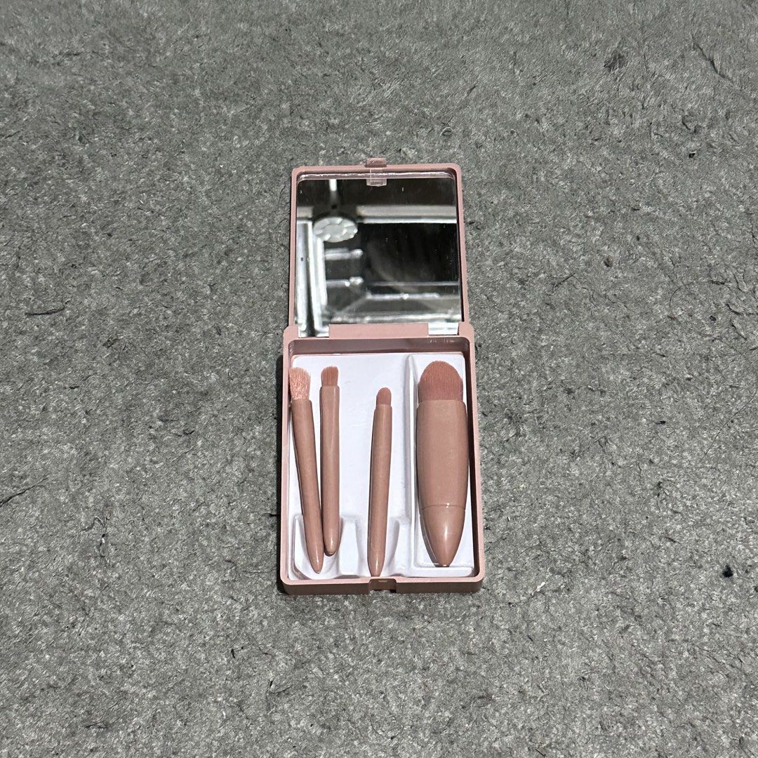 Pink Makeup Brush Set With Mirror Compact (Category: Makeup) located in Lipa City. Submitted by jecoparra (Listing ID 1466031297, Image 1). Description: - Compact pink case with built-in mirror - Includes 4 essential mini makeup brushes - Secure individual slots keep brushes in place - Snap-shut design protects against dust and dirt - Perfect size for travel, purse, and daily touch-ups - 100% brand new and ready to ship!.