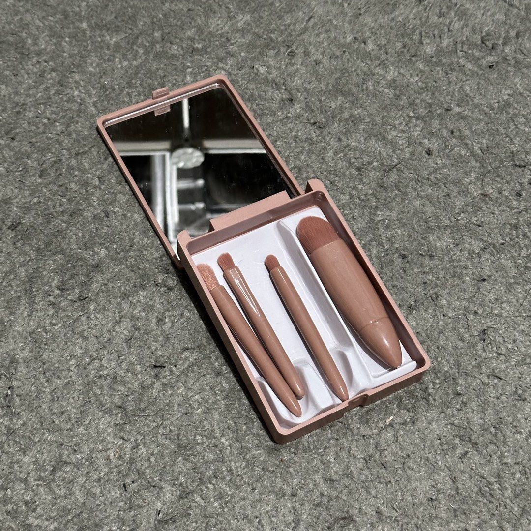 Pink Makeup Brush Set With Mirror Compact (Category: Makeup) located in Lipa City. Submitted by jecoparra (Listing ID 1466031297, Image 2). Description: - Compact pink case with built-in mirror - Includes 4 essential mini makeup brushes - Secure individual slots keep brushes in place - Snap-shut design protects against dust and dirt - Perfect size for travel, purse, and daily touch-ups - 100% brand new and ready to ship!.