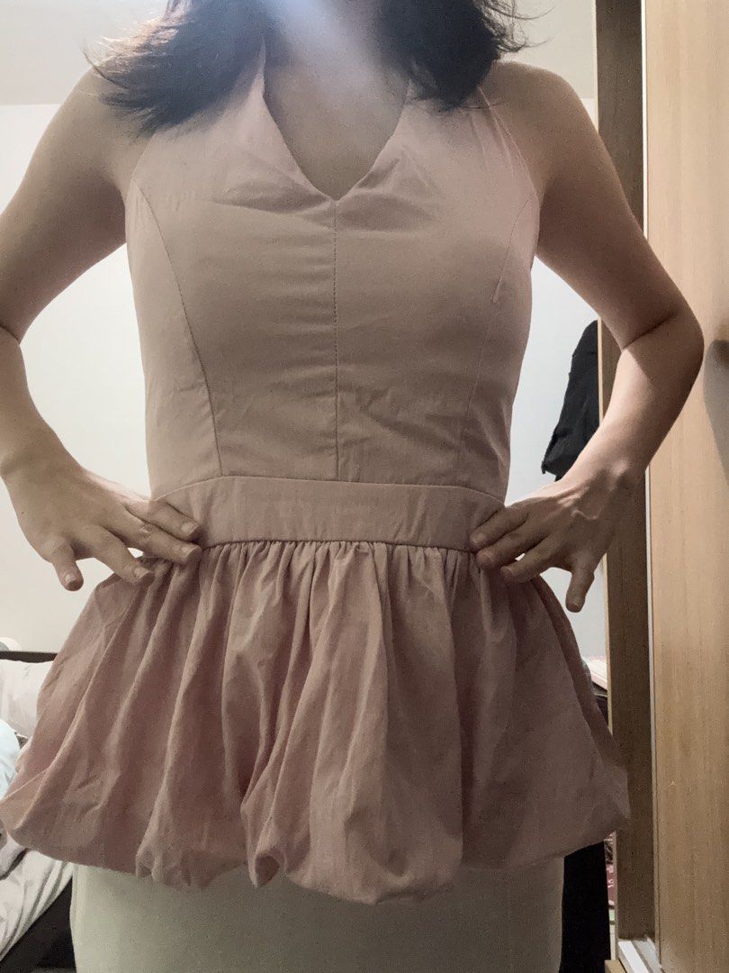 Pink Peplum Backless Top (Category: Sleeveless) located in Caloocan City. Submitted by tineq (Listing ID 1466112499, Image 2). Description: Bought sa Vietnam but sadly maliit pala siya nung sinukat ko. Freesize but kasya sakin na usually XS-S ang fit. Never used, sinukat lang..