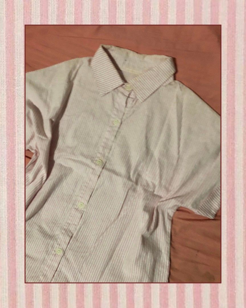 Pink striped shirt (Category: Shirts) located in Paranaque City. Submitted by 2nd.chance_ph (Listing ID 1466070600, Image 2). Description: ˚₊۶ৎ˙⋆ Pink striped shirt ✂ ₱rice: ₱40 ❝ A simple cute shirt. ❞ ⋆˚𖥔 ݁ ˖𓂃.☘︎ ݁˖ Size: S (DM for exact measurements) DM to order ˚꩜ .ᐟ Pink and white striped short sleeve button-down shirt. Classic collared neckline with front button closure. Casual fit with rolled cuffs on the sleeves. Great basic piece to ma
