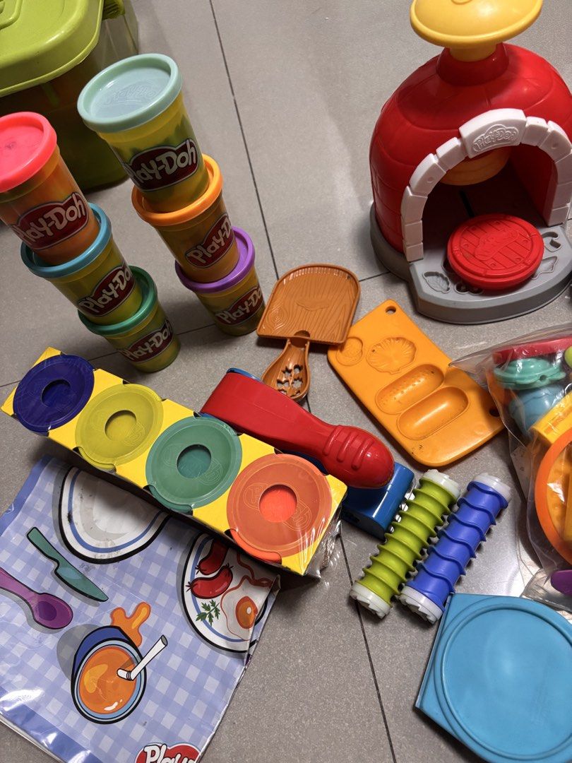 Play-Doh Kitchen Creations Pizza Oven and Pasta Maker Bundle (Category: Kids Toys) located in Quezon City. Submitted by onlinebazaare (Listing ID 1466103633, Image 2). Description: - Massive Play-Doh kitchen playset bundle - Includes pizza oven, pasta press, and BBQ grill - Comes with tons of molds, rollers, cutters, and shaping tools in bright colors - Includes a few starter tubs of Play-Doh dough - Clean, well-maintained, and ready for a new ho