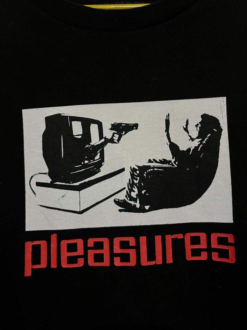 Pleasures Graphic Tee Black XL (Category: Tshirts & Polo Shirts ) located in Manila. Submitted by konjee.dathird (Listing ID 1466040461, Image 2). Description: Authentic Black Pleasures graphic tee in size XL. Features a bold front screen print of a TV pointing a gun. Made from 100% comfortable cotton with a regular fit 850 plus sf.