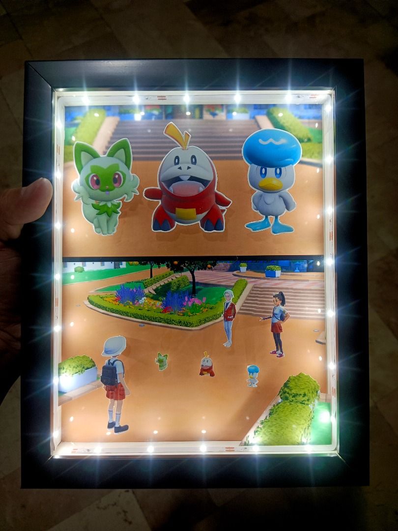 Pokemon Scarlet & Violet (Generation 9) Video Game Shadow Box (Category: Nintendo) located in Quezon City. Submitted by natzuki10 (Listing ID 1465976973, Image 2). Description: Pokemon Scarlet & Violet (Generation 9) Video Game Shadow Box Height: 10 inches Width: 8 inches *Handmade Pixel Shadow Boxes *Accepting Customized Designs *Perfect for Gamers & Collectors #videogames #nintendo #roomdecor #collection #gamer #gift.