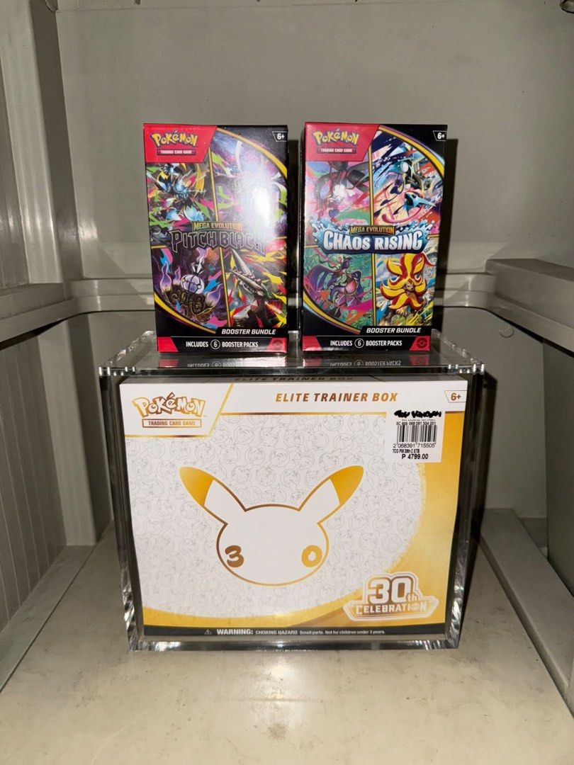 Pokémon Booster Bundle English (Category: Card Boxes & Cases) located in Manila. Submitted by bibliophile_ph (Listing ID 1465971037, Image 1). Description: Two sealed Pokémon Mega Evolution booster bundles, Pitch Black and Chaos Rising. These items are in pristine, factory-sealed condition, making them a fantastic addition for any collector looking to secure these specific sets. Note: 3,000 each but can do 5,700 for both.