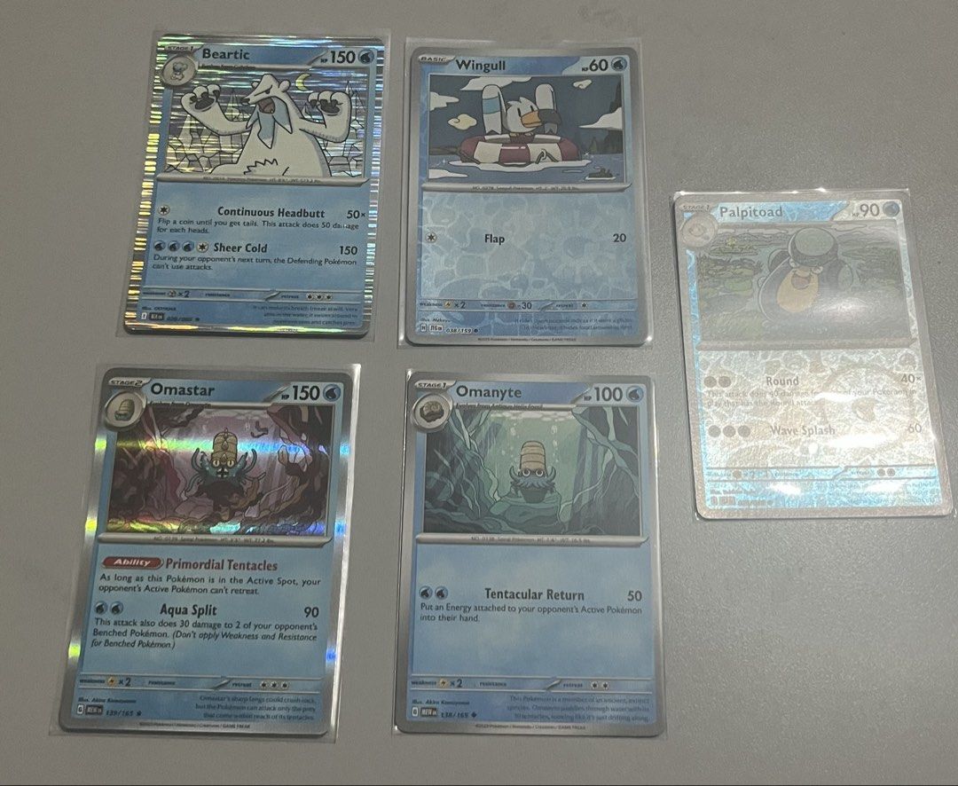 Pokémon TCG Assorted “Holo Rare Beartic/ Omastar, Reverse Holo Wingull, Palpitoad & Omanyte” (Blue) (Category: Raw Singles) located in Quezon City. Submitted by pwrproductions (Listing ID 1465994613, Image 2). Description: ₱30 each.