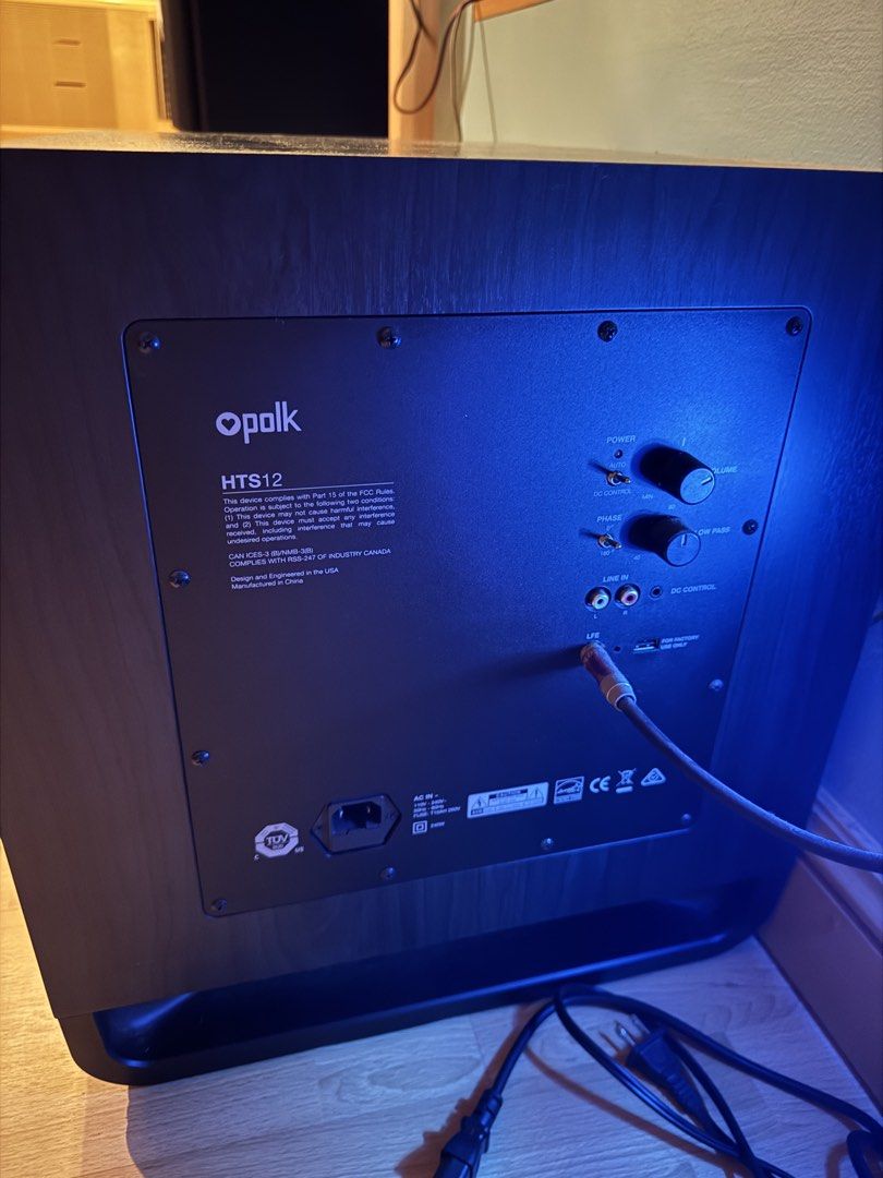 Polk HTS12 Powered Subwoofer (Category: Soundbars, Speakers & Amplifiers) located in Cebu City. Submitted by luke.oriens (Listing ID 1466136472, Image 2). Description: - Model: Polk HTS12 Powered Subwoofer - Finish: Sleek black wood - Bass: Front-firing design with integrated power port for deep, punchy response - Controls: Rear panel volume, low pass filter, phase switch, and power toggle - Connectivity: LFE input and standard line inputs - Cond