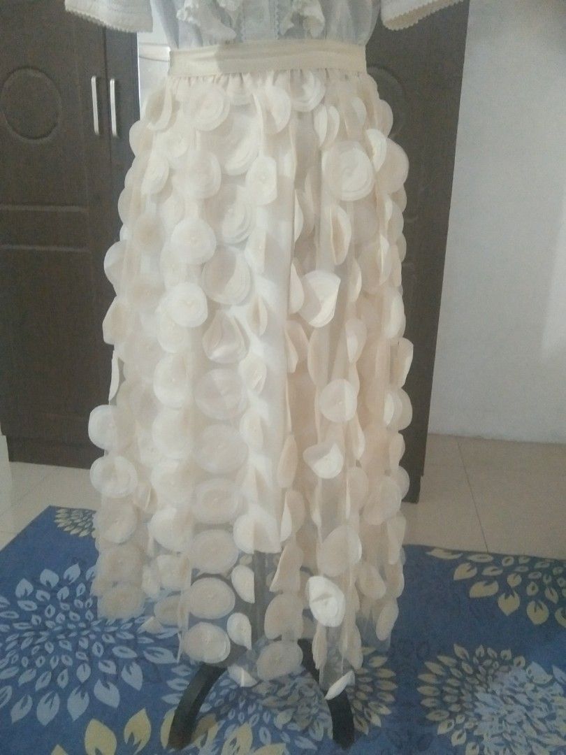 Polka dot sheer skirt (Category: Skirts) located in San Fernando. Submitted by kitkat.astina (Listing ID 1465966403, Image 1). Description: cream color not used garter waist 27- 33 inches waist.