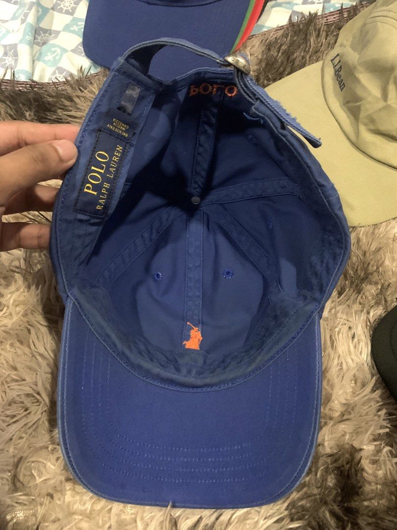 Polo Ralph Lauren Blue Cap with Orange Logo (Category: Caps & Hats) located in Manila. Submitted by jay_seller (Listing ID 1465963301, Image 2). Description: - Brand: Polo Ralph Lauren - Color: Royal blue with vibrant orange embroidered pony logo and 'POLO' back lettering - Material: 100% cotton - Size: Adjustable strapback with metal buckle closure - Origin: Made in Cambodia - Condition: Brand new / Excellent daily casual wear - Fast shipping an