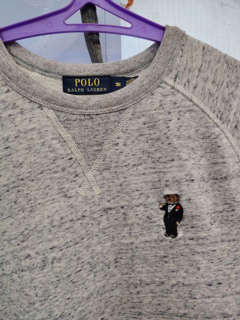 Polo Ralph Lauren Grey Bear Sweatshirt (Category: Coats, Jackets and Outerwear) located in General Santos City (Dadiangas). Submitted by rafaelmir09800 (Listing ID 1466089287, Image 2). Description: - Brand: Polo Ralph Lauren - Style: Grey heather crewneck sweatshirt - Size: Medium (M) - Design: Small embroidered Tuxedo Polo Bear graphic on the chest - Details: Ribbed cuffs and hem for a snug fit - Origin: Made in Cambodia - Condition: Excellent,