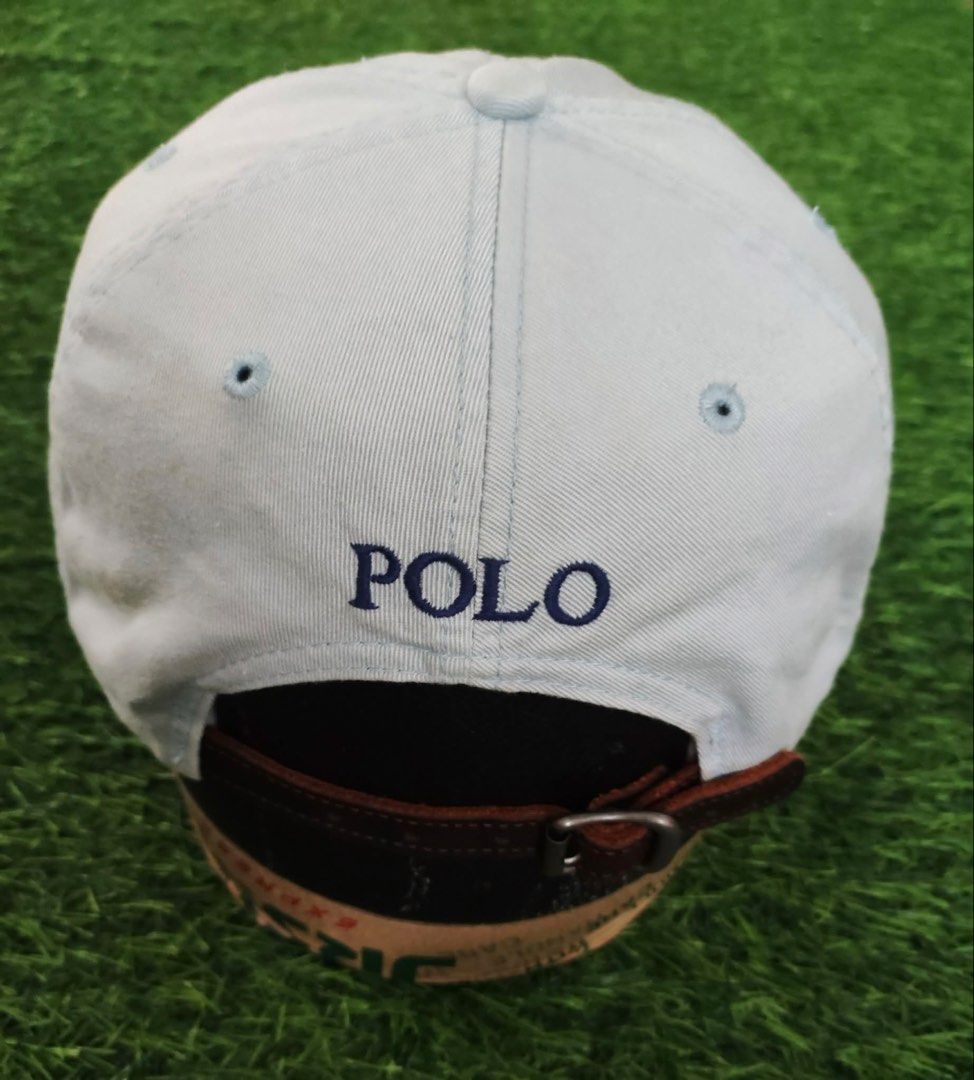 Polo Ralph Lauren Light Blue Baseball Cap (Category: Caps & Hats) located in Makati City. Submitted by rare_thrift_stuff (Listing ID 1465970630, Image 3). Description: - Brand: Polo Ralph Lauren - Color: Light blue with dark blue embroidered pony logo - Material: 100% cotton - Details: 'POLO' embroidered on the back, made in Taiwan tag inside - Closure: Adjustable brown leather strap with metal buckle - Condition: Excellent, stylish and ready to 
