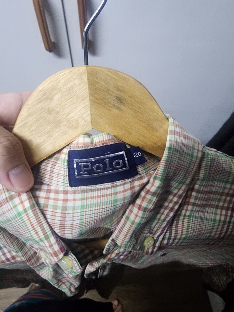 Polo Ralph Lauren Plaid Button-Down Shirt (Category: Tshirts & Polo Shirts ) located in Manila. Submitted by ybn15 (Listing ID 1466127642, Image 3). Description: - Brand: Polo Ralph Lauren - Design: Multi-color plaid (brown, green, red checks) - Details: Long sleeves, button cuffs, classic collar, embroidered pony logo on chest - Size: 20 - Condition: Clean, well-kept, and ready to wear.