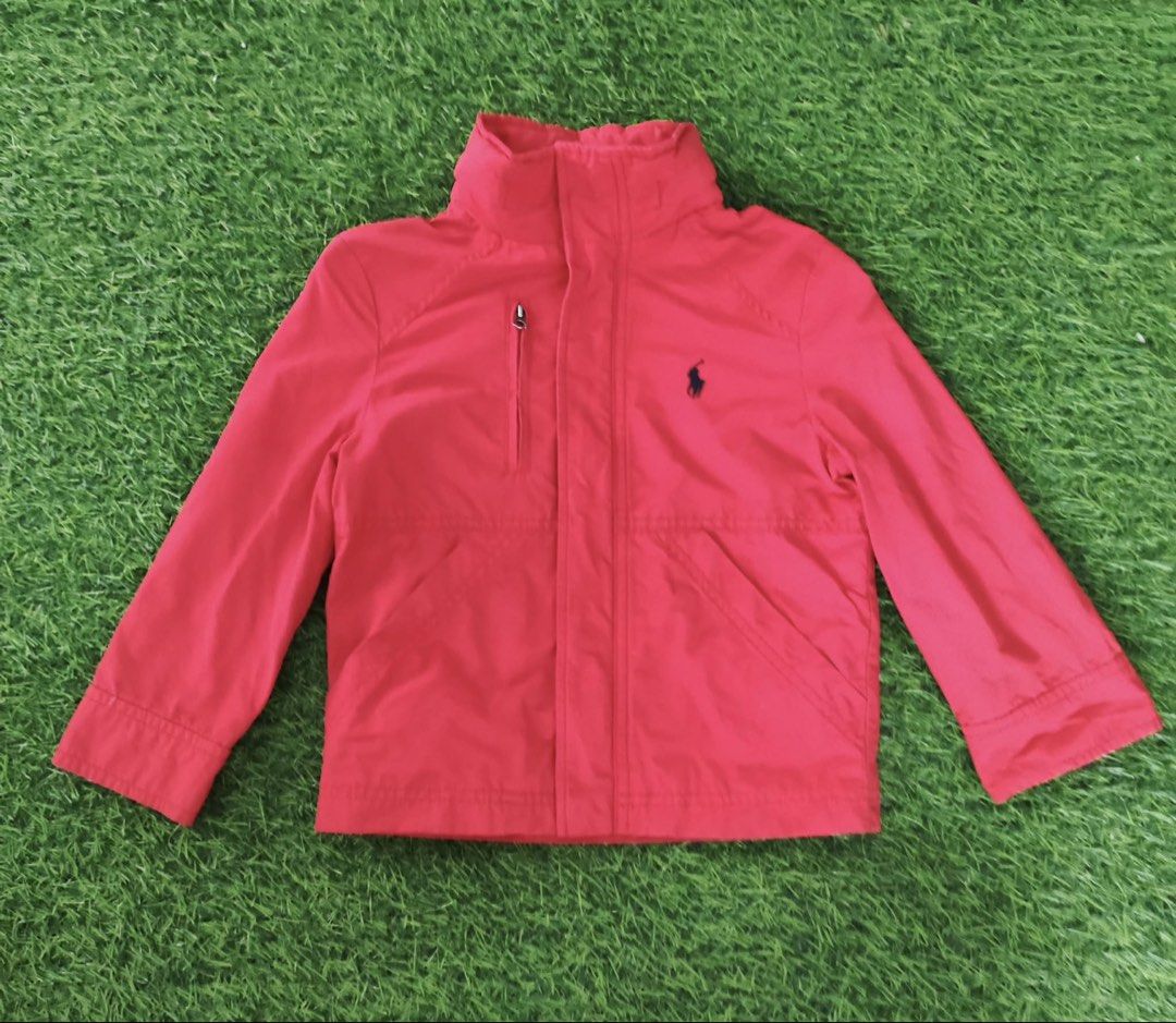 Polo Ralph Lauren Red Jacket 4/4T (Category: Babies & Kids Fashion) located in Makati City. Submitted by rare_thrift_stuff (Listing ID 1465972218, Image 1). Description: - Brand: Polo Ralph Lauren - Size: 4 / 4T (Toddler) - Color: Bright red - Closure: Full zip with vintage-style Talon hardware - Design: Mock neck collar with signature embroidered pony logo - Pockets: Angled front pockets plus a vertical zippered chest pocket - Condition: Great l