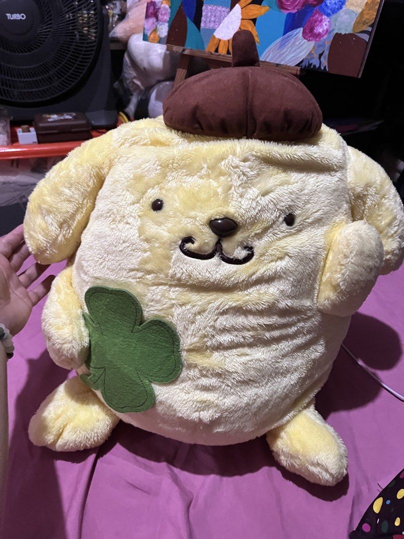 POMPOMPURİN W CLOVER LEAF BIG PLUSH (Category: Plushies & Soft Toys) located in Paranaque City. Submitted by bonsaiart (Listing ID 1466095865, Image 1). Description: Pre owned Good condition Huggable Bulky 3950+sf Payment via gcash or paymaya Shipping via j&t No to cop / cod / meetup.