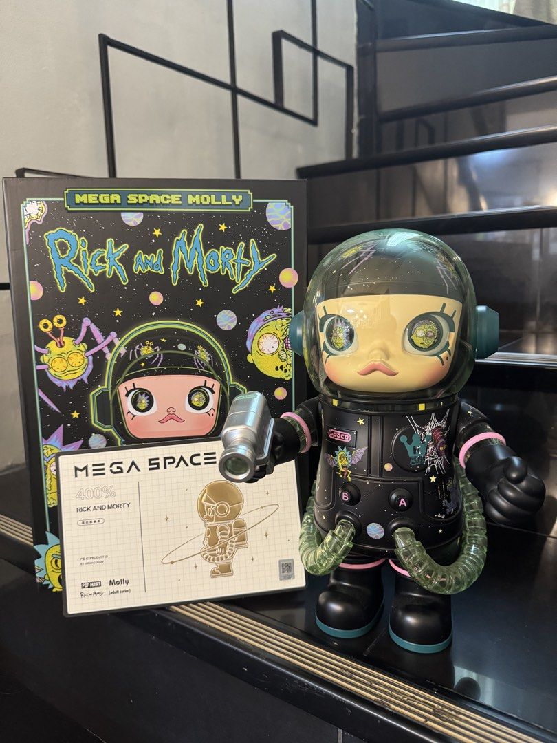 Pop Mart Mega Space Molly Rick and Morty 400% (Category: Designer & Blind Box Toys) located in Manila. Submitted by azyl.la (Listing ID 1466003609, Image 1). Description: - Item: Pop Mart Mega Space Molly 400% Rick and Morty Edition - Design: Black spacesuit with iconic show graphics and character eyes inside the helmet visor - Accessories: Includes the signature small silver accessory - Inclusions: Complete with original box and authenticity car