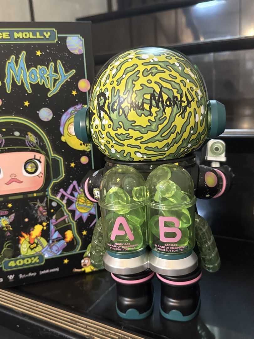 Pop Mart Mega Space Molly Rick and Morty 400% (Category: Designer & Blind Box Toys) located in Manila. Submitted by azyl.la (Listing ID 1466003609, Image 3). Description: - Item: Pop Mart Mega Space Molly 400% Rick and Morty Edition - Design: Black spacesuit with iconic show graphics and character eyes inside the helmet visor - Accessories: Includes the signature small silver accessory - Inclusions: Complete with original box and authenticity car