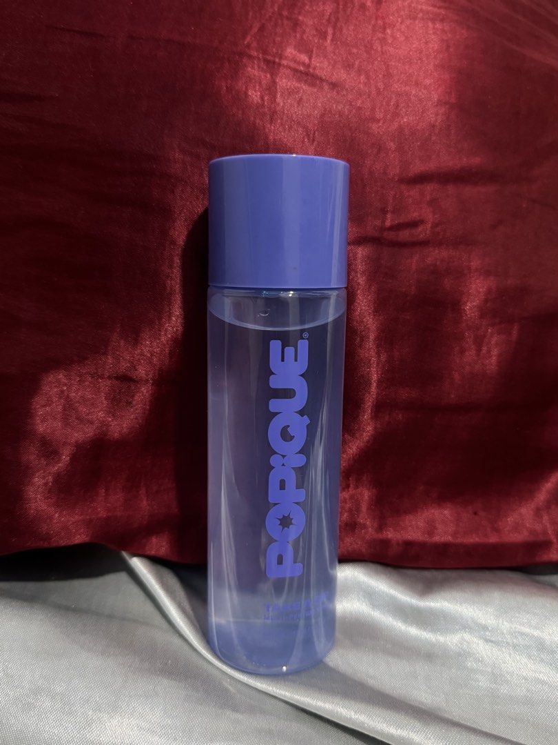 Popique Take A Sip Multi-Peptide Toning Essence 145ml (Category: Face Care) located in Manila. Submitted by 444sky (Listing ID 1466108902, Image 1). Description: - Brand: Popique - Product: Take A Sip Multi-Peptide Toning Essence - Size: 145 ml / 4.9 fl. oz. - Benefits: Provides deep hydration and strengthens the skin barrier - Packaging: Clear formula in a purple bottle with matching cap - Perfect addition to your daily skincare routine.