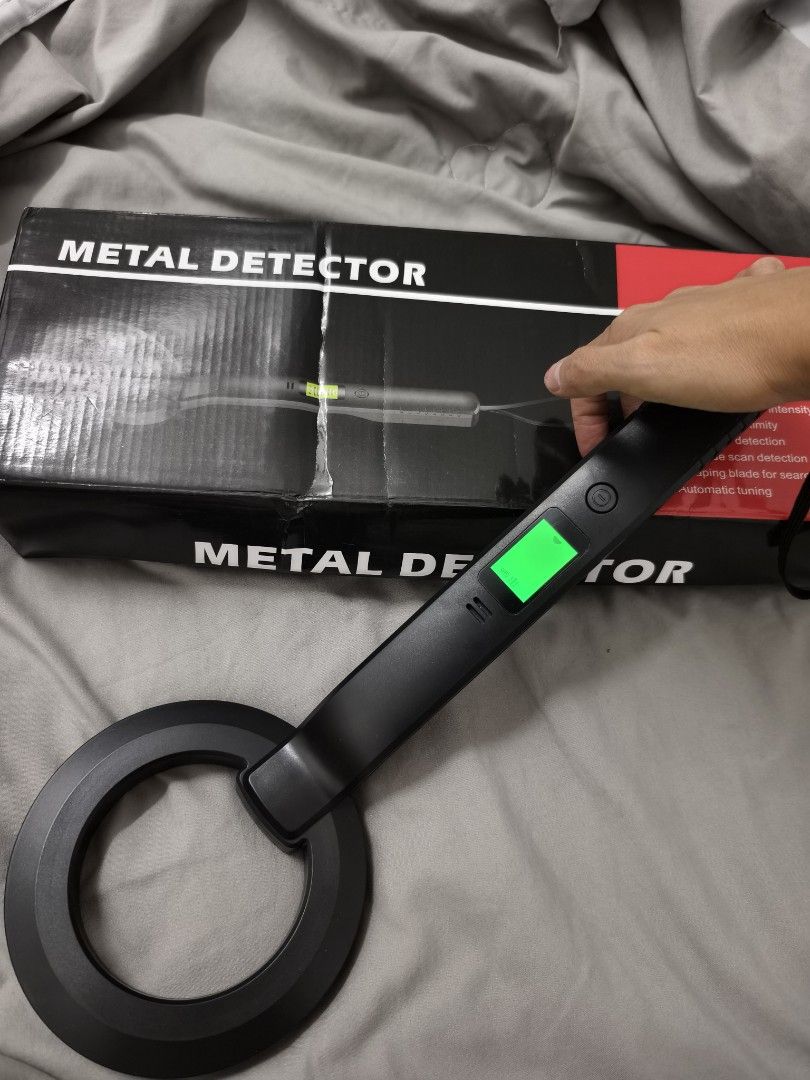 Portable Handheld Metal Detector with Original Box (Category: Construction Tools & Equipment) located in Angeles City. Submitted by measaliman02351 (Listing ID 1465965985, Image 1). Description: - Black handheld metal detector with built-in display screen and round search coil - Simple one-touch operation with a convenient power button near the handle - Ideal for security checks, event screening, or hobby treasure hunting - Includes original reta