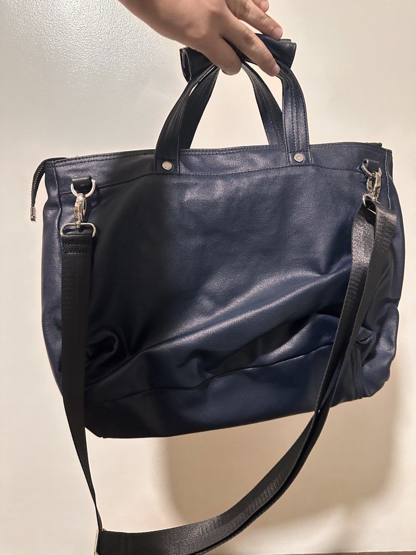 Porter International 2-way briefcase (Category: Sling Bags) located in Makati City. Submitted by coachjohndizon (Listing ID 1466103607, Image 2). Description: Porter International 2-way briefcase (navy coated canvas, silver hardware) .