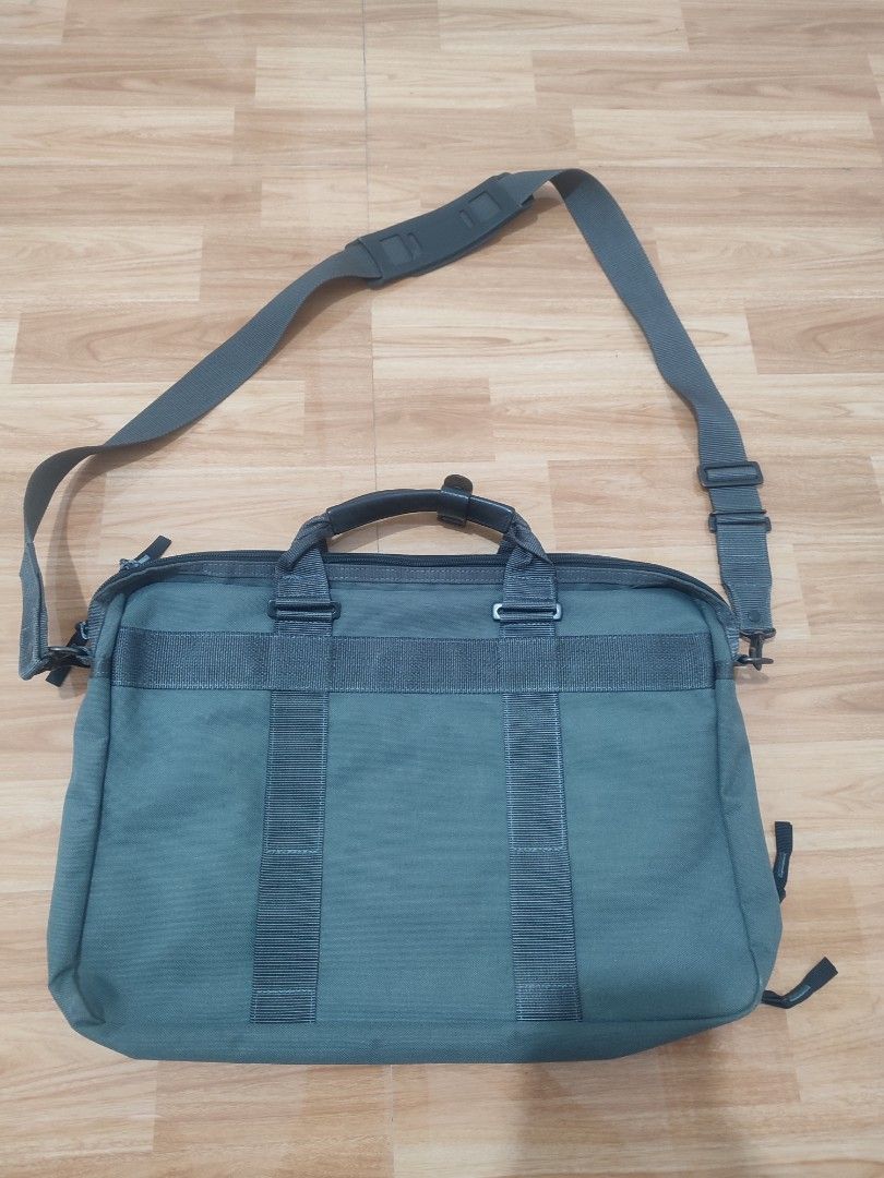 Porter Tokyo Yoshida & Co. Grey Briefcase Bag (Category: Briefcases) located in Lipa City. Submitted by gudoys_outdoor16 (Listing ID 1466081849, Image 2). Description: - Authentic Porter Tokyo Yoshida & Co. briefcase in versatile grey - Durable canvas construction with sturdy dual handles - Includes an adjustable shoulder strap with a comfortable padded guard - Multiple exterior and interior zippered compartments, slip pockets, and pen holders - 