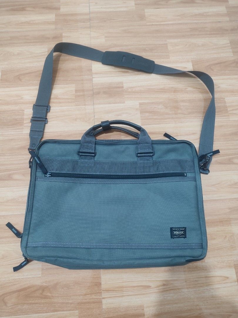 Porter Tokyo Yoshida & Co. Grey Briefcase Bag (Category: Briefcases) located in Lipa City. Submitted by gudoys_outdoor16 (Listing ID 1466081849, Image 1). Description: - Authentic Porter Tokyo Yoshida & Co. briefcase in versatile grey - Durable canvas construction with sturdy dual handles - Includes an adjustable shoulder strap with a comfortable padded guard - Multiple exterior and interior zippered compartments, slip pockets, and pen holders - 