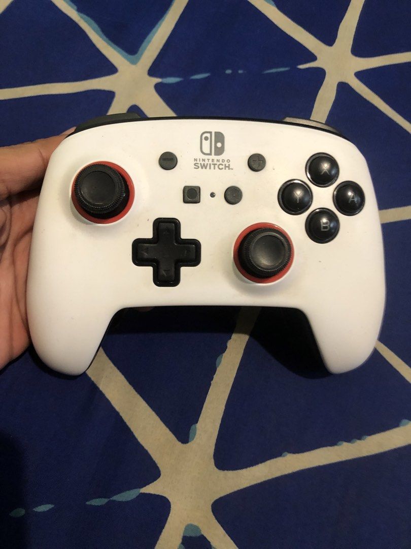 Power A Nintendo switch ProbController Licensed by Nintendo (Category: Controllers) located in Quezon City. Submitted by markgolveo (Listing ID 1465995409, Image 1). Description: Power A Nintendo switch ProbController Licensed by Nintendo.